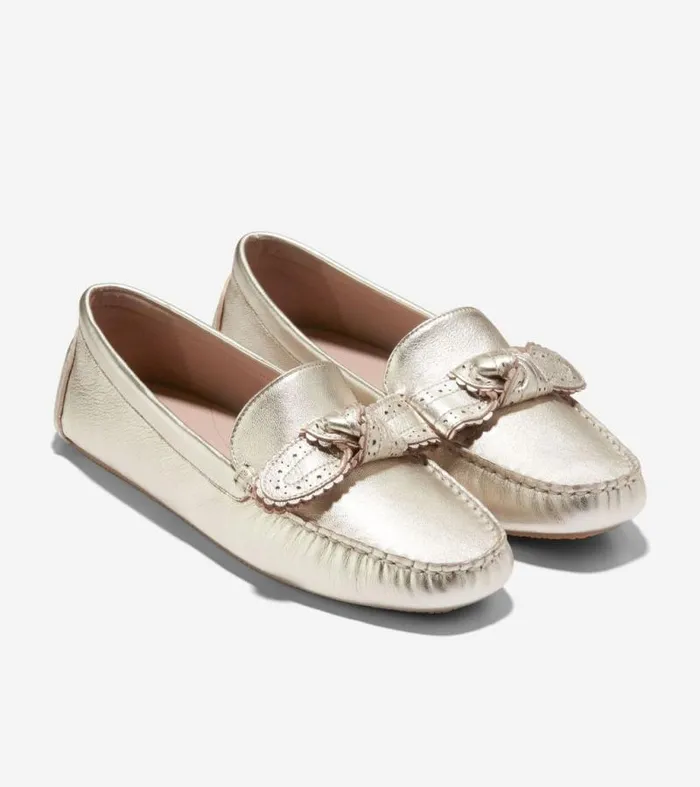 Women Loafers and Drivers Cole Haan Bellport Bow Drivers Soft Gold